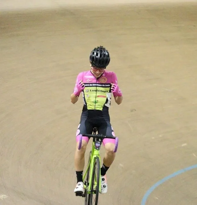 A Lopes Cycling Performance rider racing on the track at the velodrome