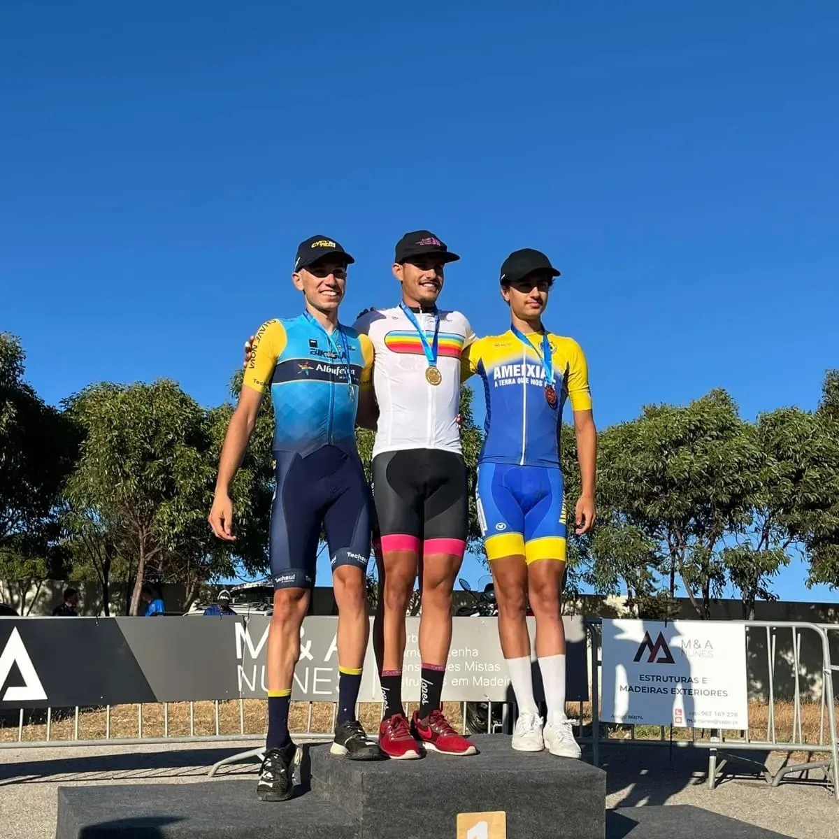 A Lopes Cycling Performance athlete celebrating a win